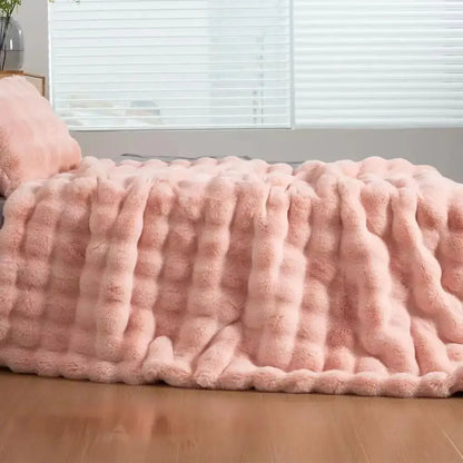 Plush faux rabbit light pink faux fur throw blanket with chunky knit pattern soft cozy warm thick rabbit blanket