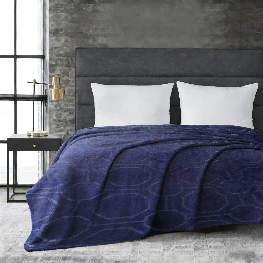 Deep navy blue rabbit blanket with plush faux rabbit fur and subtle geometric pattern for cozy warmth