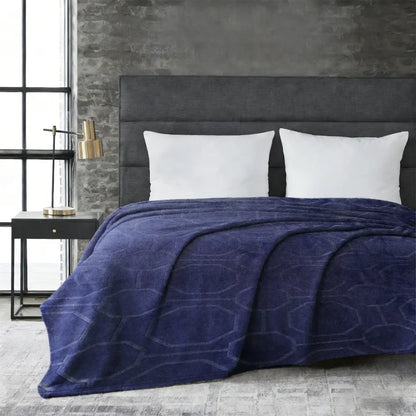 Deep navy blue rabbit blanket with plush faux rabbit fur and subtle geometric pattern for cozy warmth