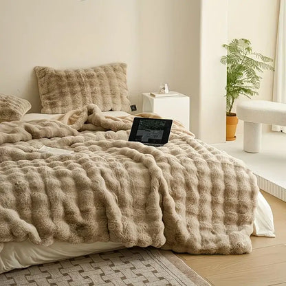 Beige faux fur throw blanket with plush faux rabbit fur texture soft cozy warm and thick rabbit blanket