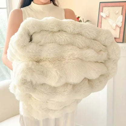 Cream-colored plush faux rabbit fur throw blanket with soft layered texture for cozy warmth and comfort
