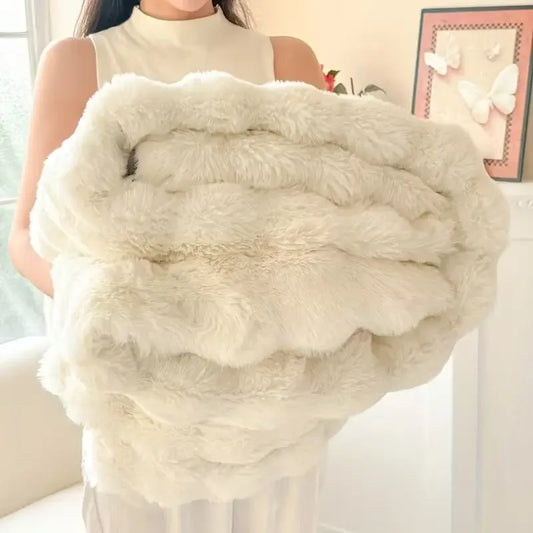 Cream-colored plush faux rabbit fur throw blanket with soft layered texture for cozy warmth and comfort