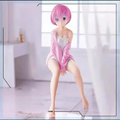 Re zero rem sitting chair pvc figure featuring pink short hair, detailed character styling, light pink robe, and gray shorts