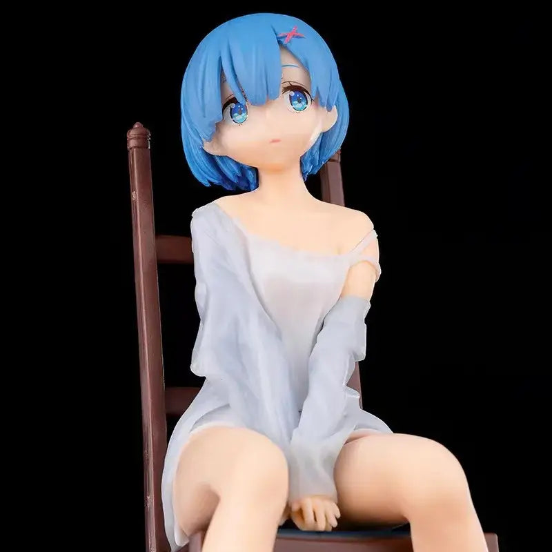 Rezero rem sitting chair pvc figure with blue hair and large eyes in light gray off-shoulder dress character styling
