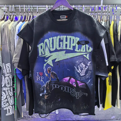Black short-sleeved cotton t-shirt with distressed rhinestone roughplay graphic of skeleton smoking by car