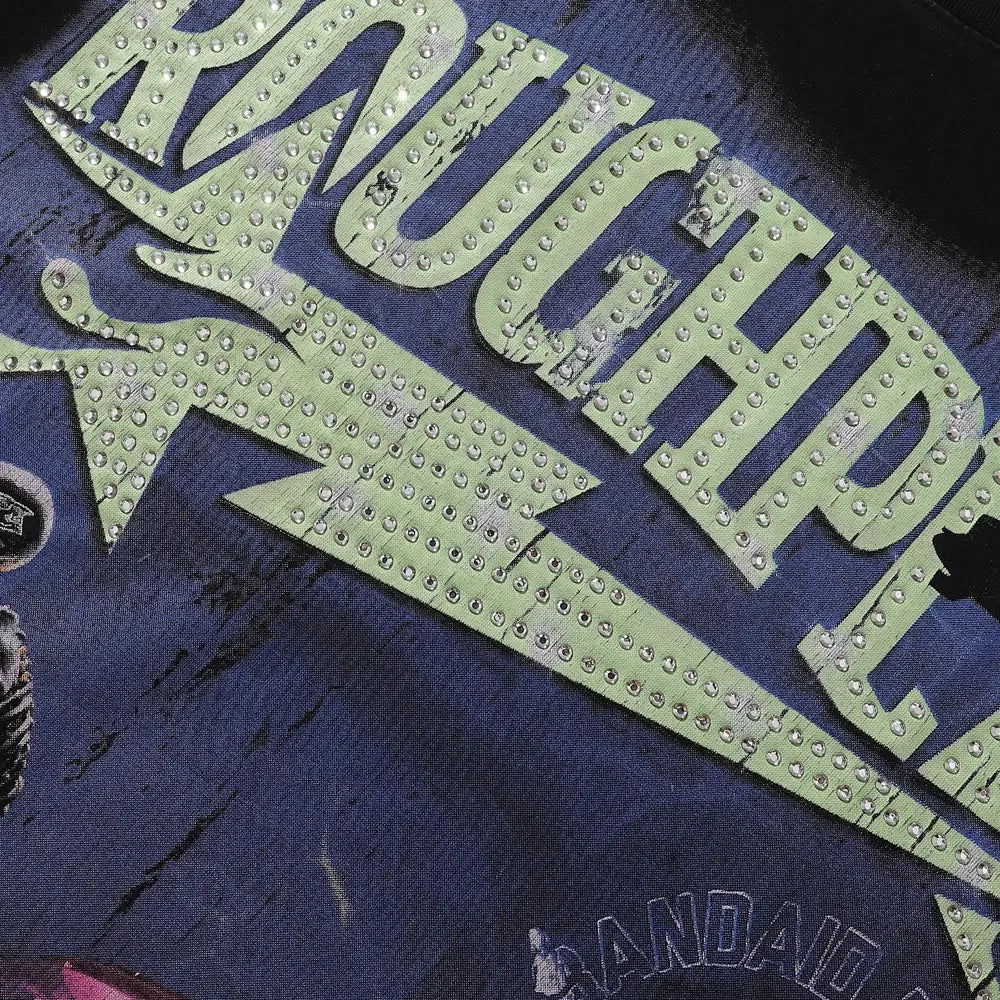 A navy blue sleeveless loose cotton t-shirt with a distressed light green much graphic and rhinestone embellishments
