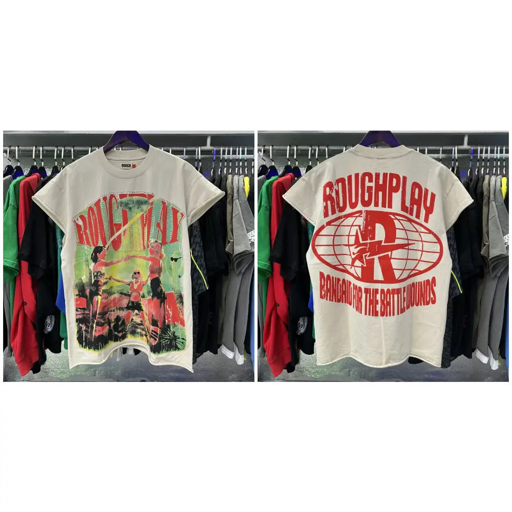 A cream cotton rhinestone printed sleeveless t shirt with red roughplay graphic and battlewounds phrase on hangers