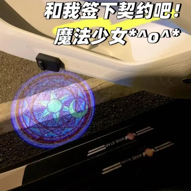 Sailor Moon luna floor projector lamp casting a glowing purple and blue magical sigil on an illuminated car door step