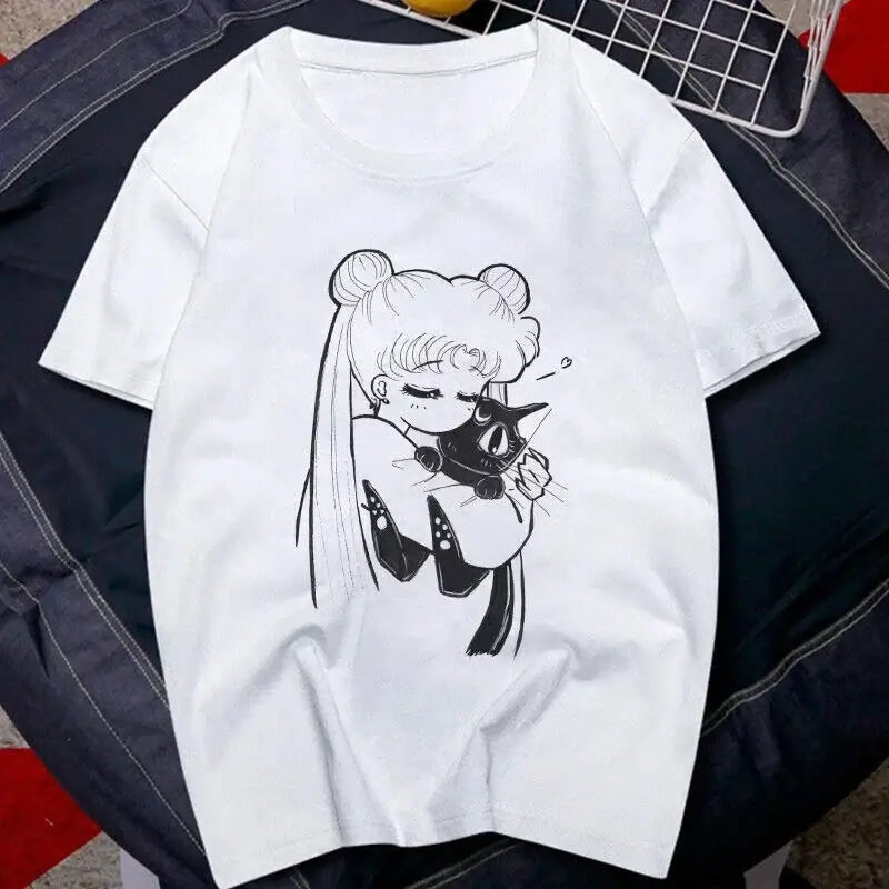 White cotton short sleeve graphic tee featuring black ink sailor moon hugging her cat luna illustration