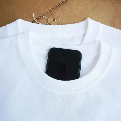 White cotton short sleeve sailor moon retro graphic tee with a black smartphone tucked into the neckline