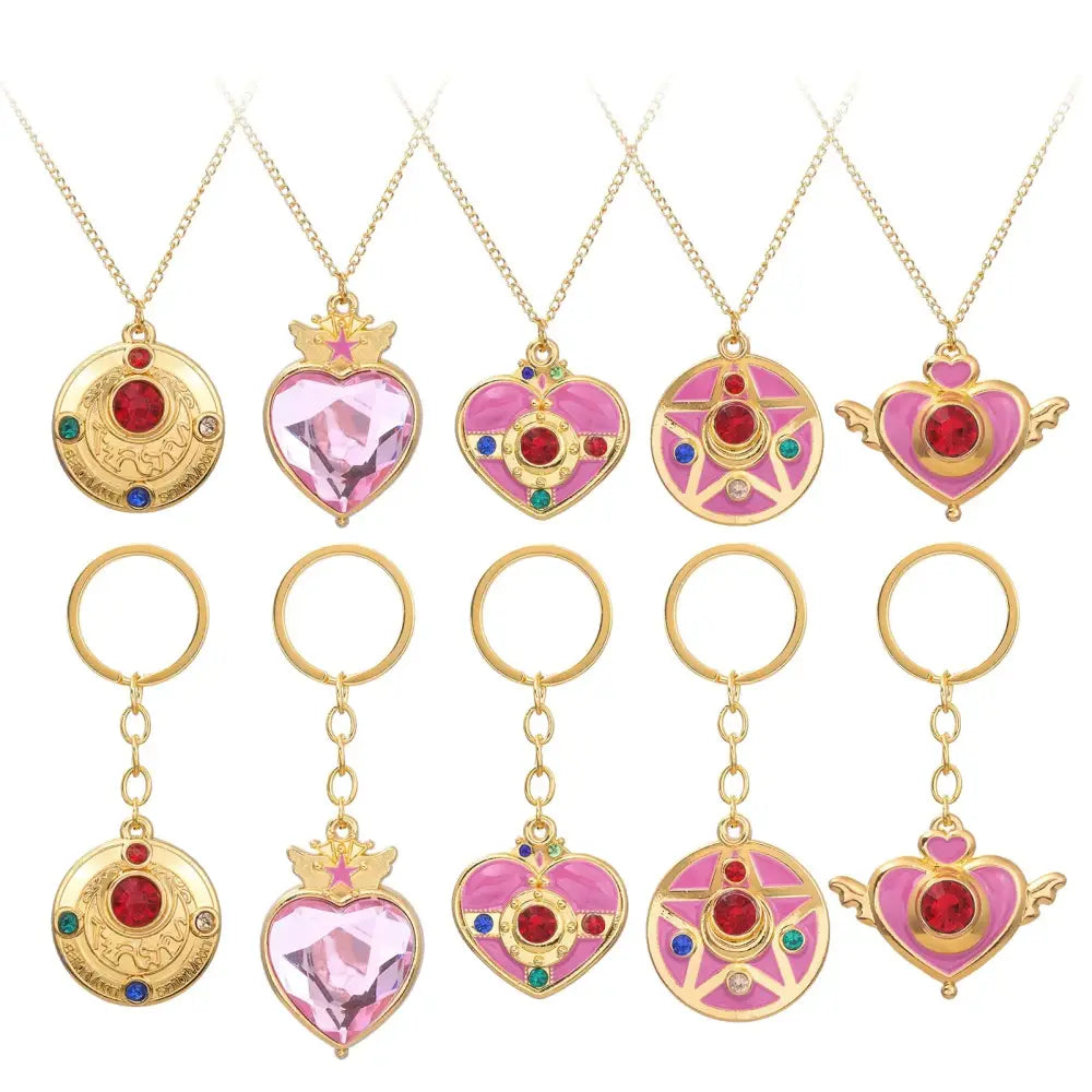 Gold-toned enamel keychain with pink red blue green designs and gemstone accents usagi enamel keychain cosplay jewelry