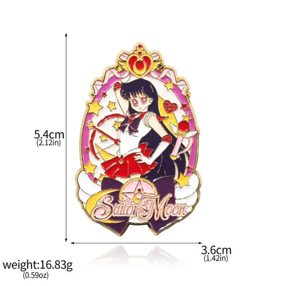 A vibrant enamel keychain featuring sailor moon in red and black with stars and a pink oval frame brooch pin design