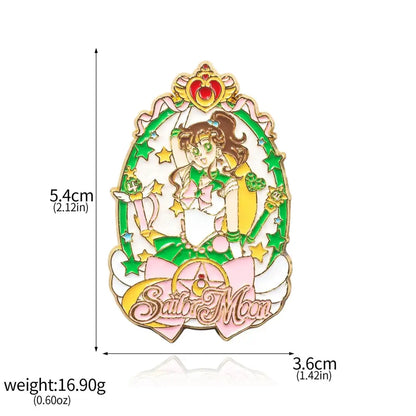 Colorful enamel keychain featuring sailor moon in green and white uniform with decorative oval border and stars design
