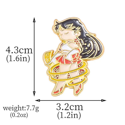 Gold-outlined enamel keychain featuring sailor moon tsukino usagi in red and white sailor uniform brooch pin design