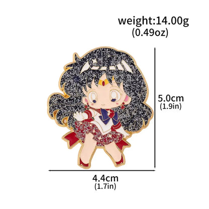 A sparkling black and red glittery enamel keychain featuring a chibi usagi sailor moon brooch pin with gold trim