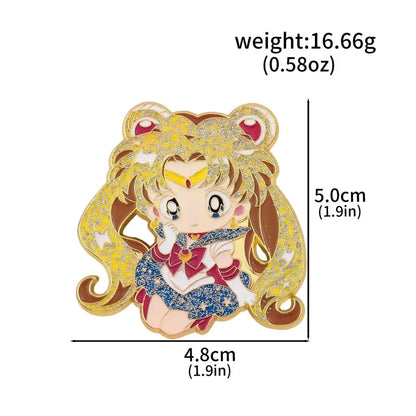 A glittery gold and blue sailor moon enamel keychain featuring a chibi character with red eyes in a star-patterned uniform