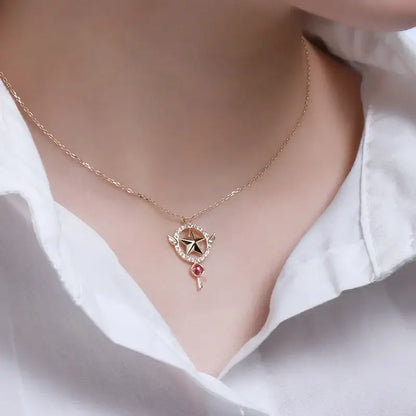 Delicate rose gold necklace with star-shaped pendant and red gemstone from sailor moon tsukino necklace set