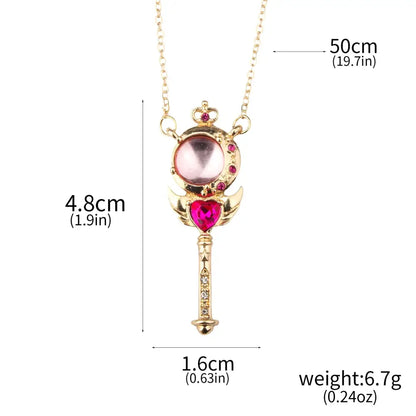 Gold-colored magical wand pendant necklace with pink gemstone and red heart crystal in sailor moon tsukino necklace set