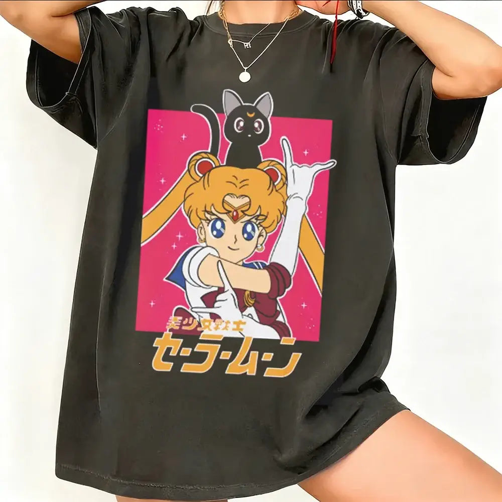 Black oversized sailor moon short sleeve t-shirt with vibrant pink graphic on breathable cotton fabric