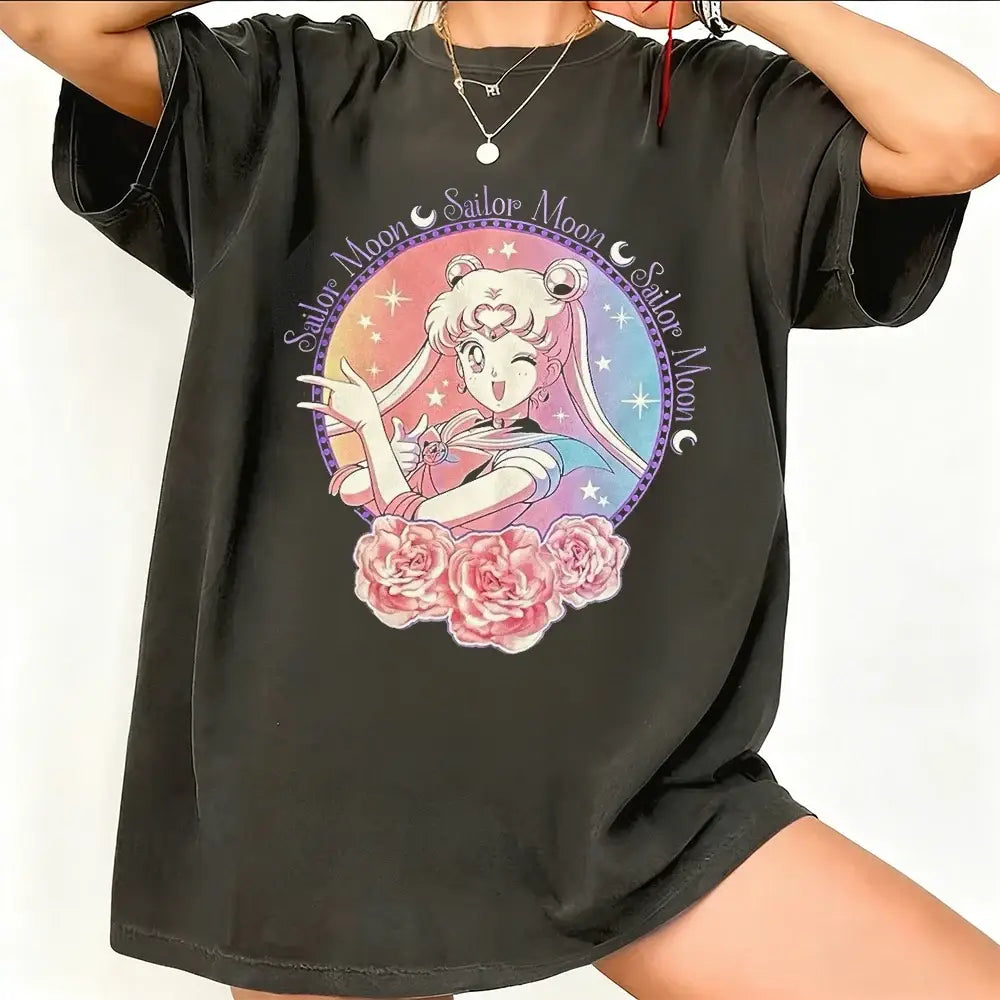 Black oversized sailor moon graphic t-shirt featuring breathable cotton short sleeve with pink roses and starry background
