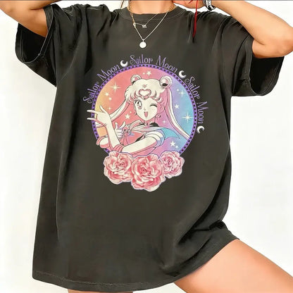 Black oversized sailor moon graphic t-shirt featuring breathable cotton short sleeve with pink roses and starry background