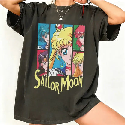 Black oversized sailor moon graphic t-shirt with colorful character grid yellow lettering breathable cotton short sleeve
