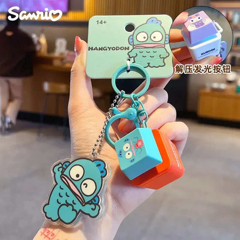 Turquoise and orange sanrio cinnamoroll keychain with clear acrylic charm and colorful buttons as a stress relief keychain light sound pendant