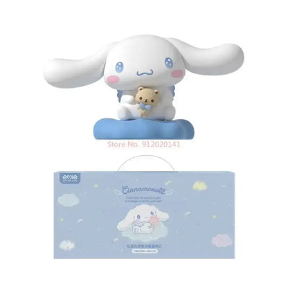 Sanrio cinnamoroll led atmosphere lamp featuring a white figurine with blue eyes holding a teddy bear on a blue base