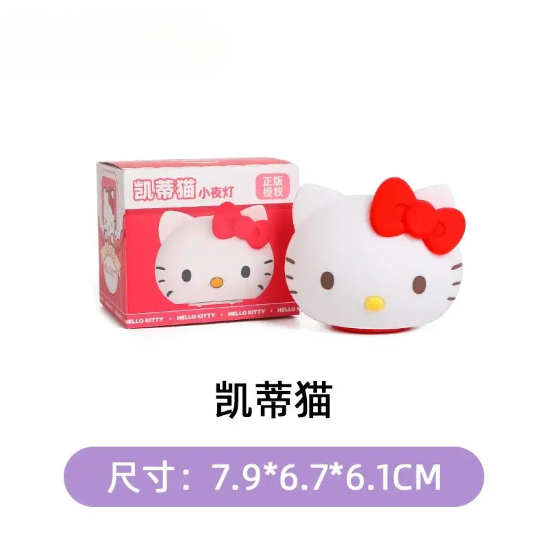 White hello kitty nightlight with red bow and yellow nose made of plastic for kids by Sanrio Cinnamoroll