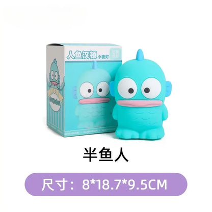 Cute turquoise silicone night light featuring sanrio cinnamoroll sea creature design with large eyes and pink mouth