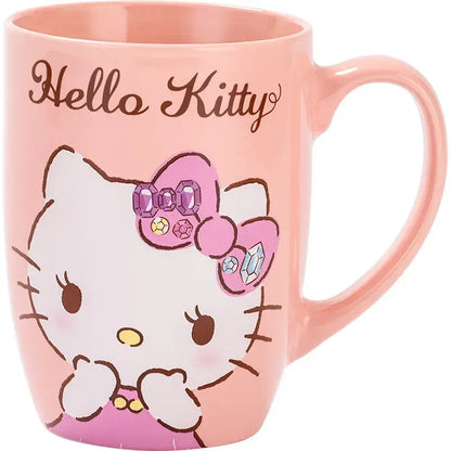 Pink ceramic mug featuring hello kitty design with jeweled bow and brown cursive lettering 600ml large capacity