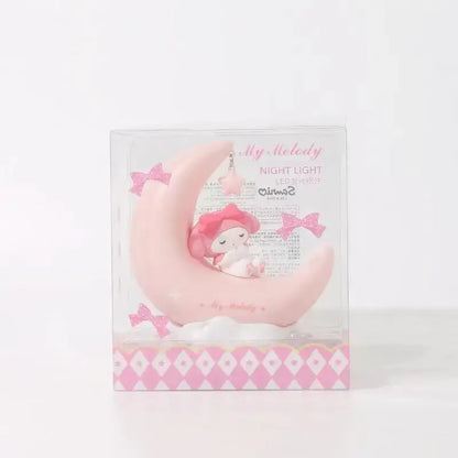 Pink my melody led crescent night light featuring the character sleeping on a crescent moon with decorative bows