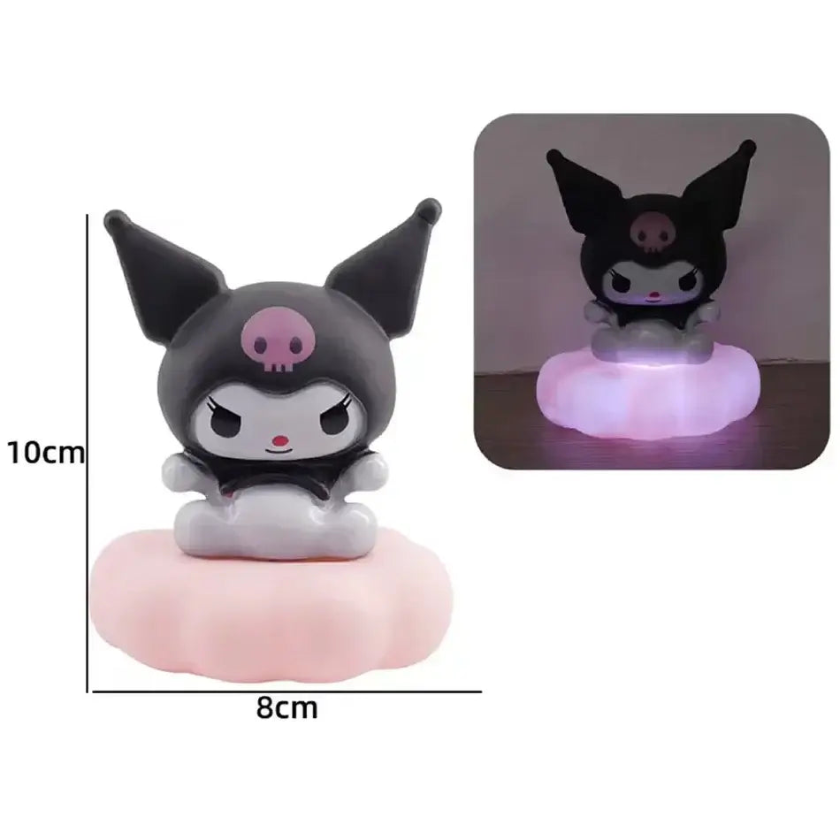 Sanrio Kuromi cloud night light LED lamp with a black and pink kawaii figurine sitting on a glowing pink cloud base