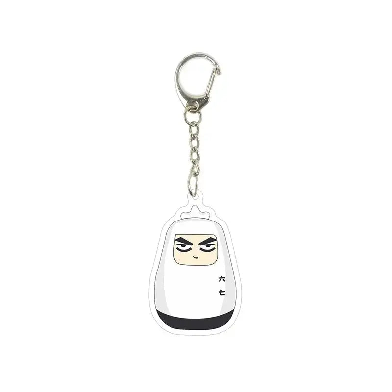 White acrylic killer seven keychain featuring a cute cartoon ninja in a white hooded outfit with black accents