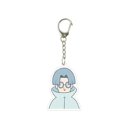 Translucent light blue killer seven acrylic keychain featuring a cartoon character with silver hair and glasses