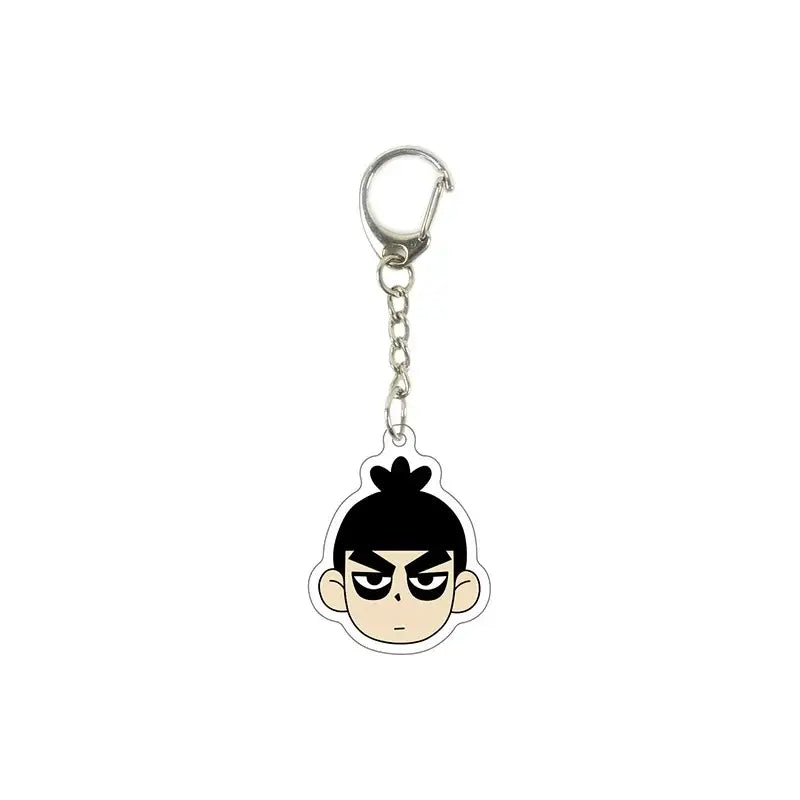 Silver-toned killer seven acrylic keychain featuring a cartoon character head with black hair and an angry expression