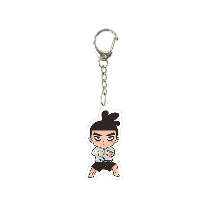 Clear acrylic killer seven keychain featuring a chibi cartoon character with black hair in a white shirt and dark shorts