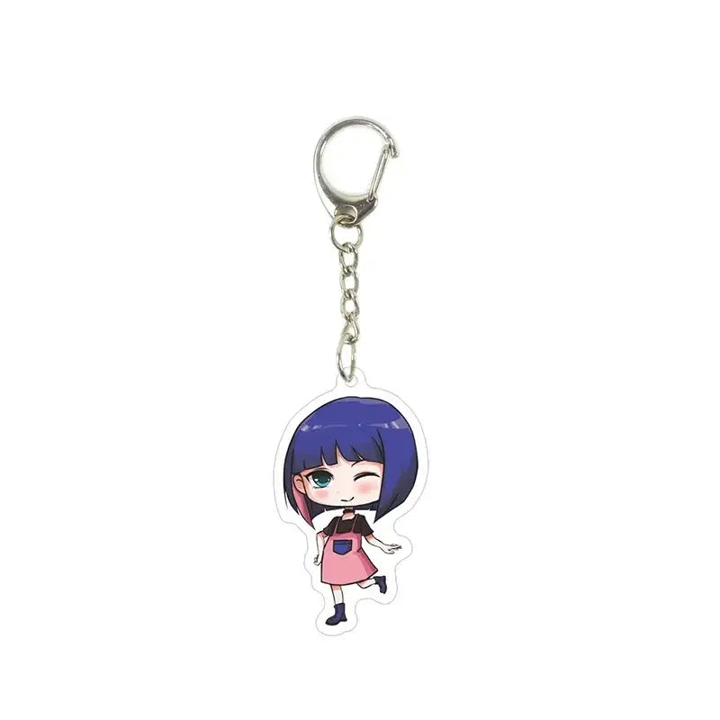 A clear acrylic killer seven keychain featuring a chibi anime girl with purple hair and a pink dress pendant