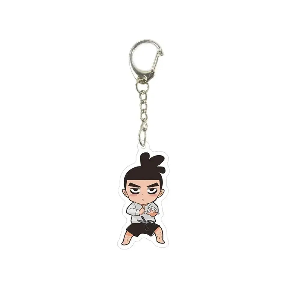 Clear acrylic killer seven keychain featuring chibi cartoon with black topknot hair in white shirt and dark shorts