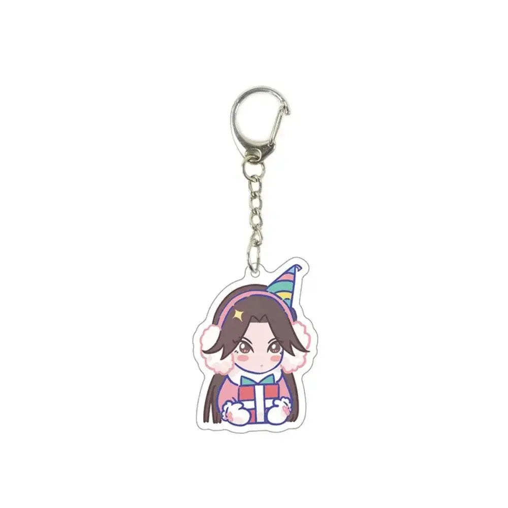 Colorful killer seven acrylic keychain featuring a cartoon girl with brown hair in pink earmuffs holding a gift