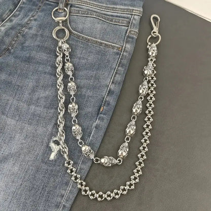 Silver stainless steel pants chain with skull engravings, twisted rope links, and spherical beads for punk biker style