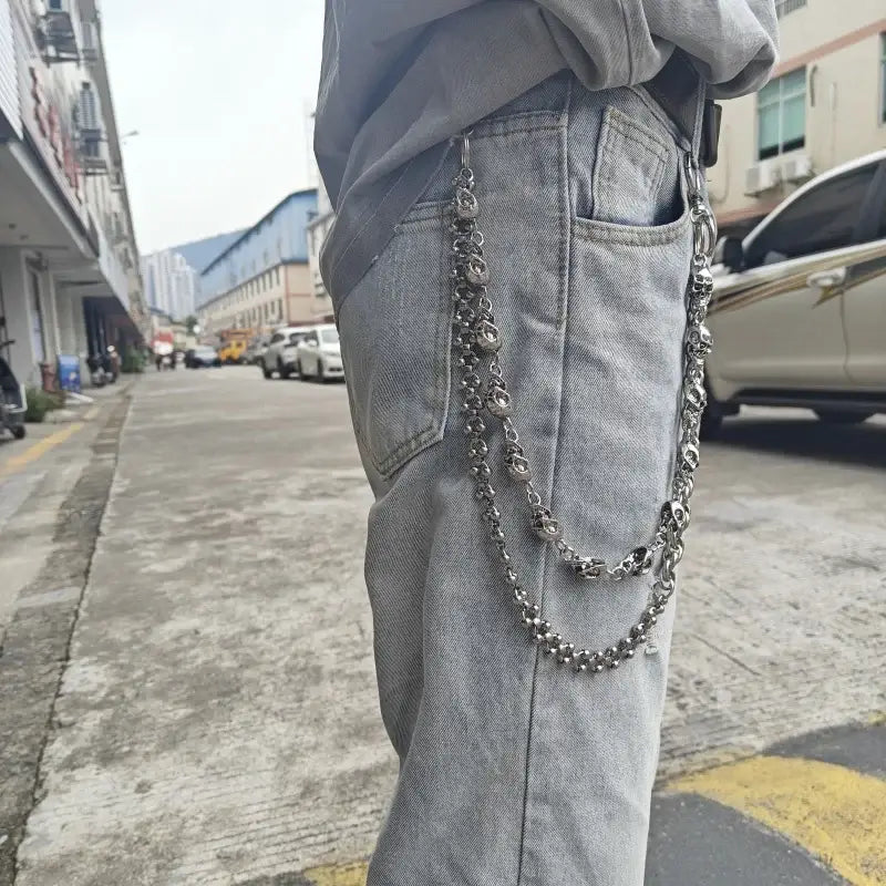 Silver stainless steel pants chain with double-layered design featuring interlocking links and skull motifs