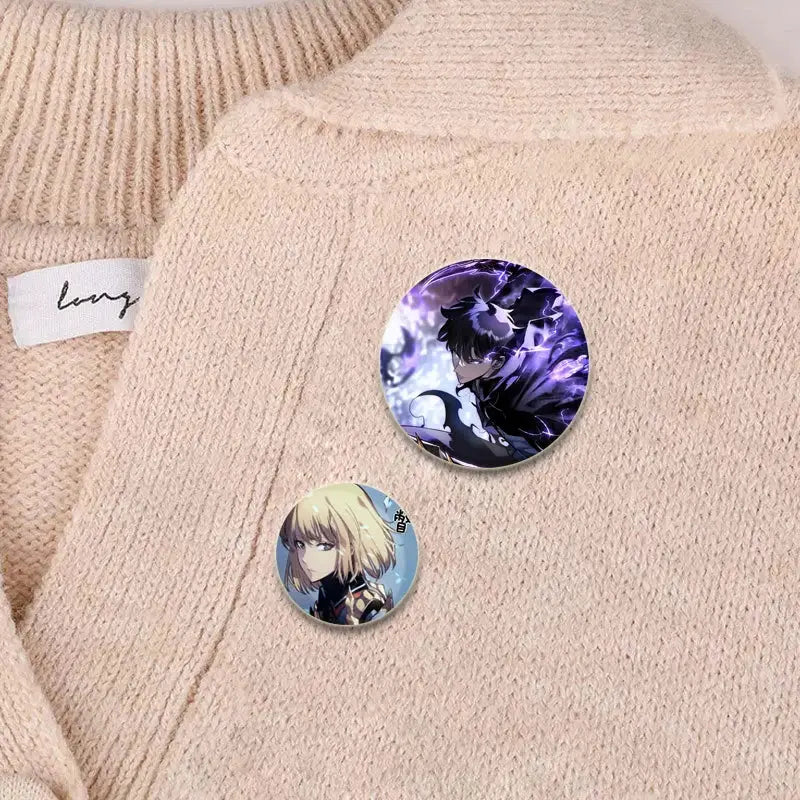 Two round handmade badge pins featuring solo leveling cheng xiaoyu dark-haired and blonde anime characters