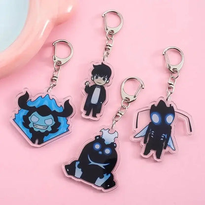 Clear acrylic solo leveling sung jin-woo keychain with black and blue cartoon design attached to silver metal clip
