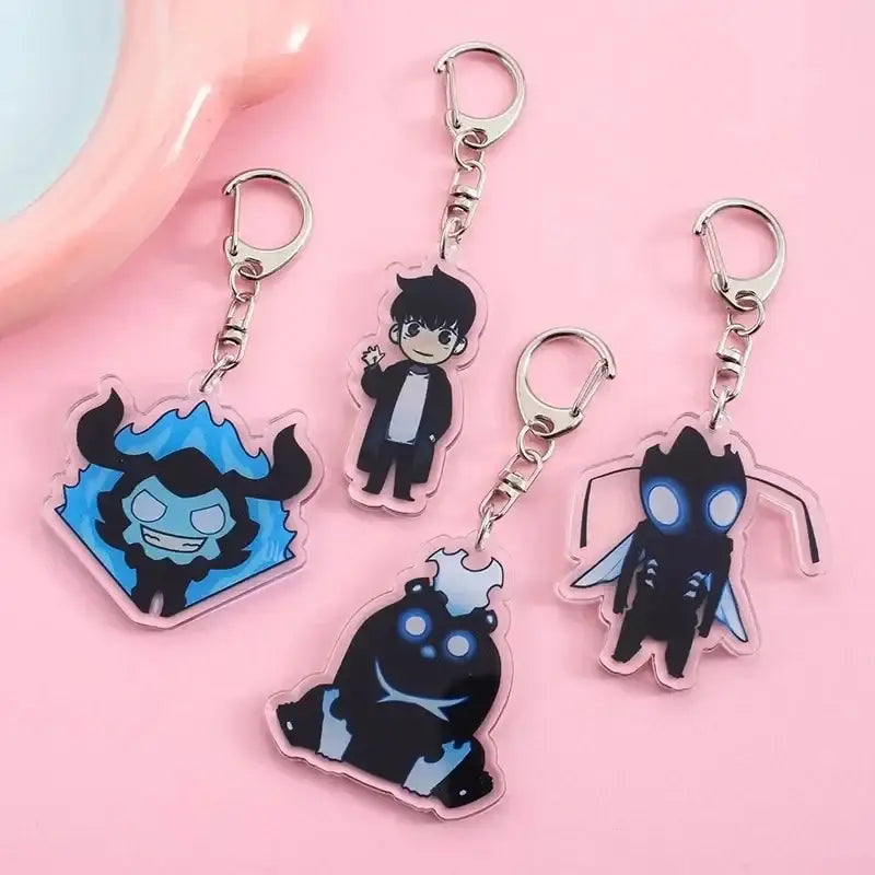 Clear acrylic solo leveling sung jin-woo keychains with black and blue cartoon designs and silver metal clips