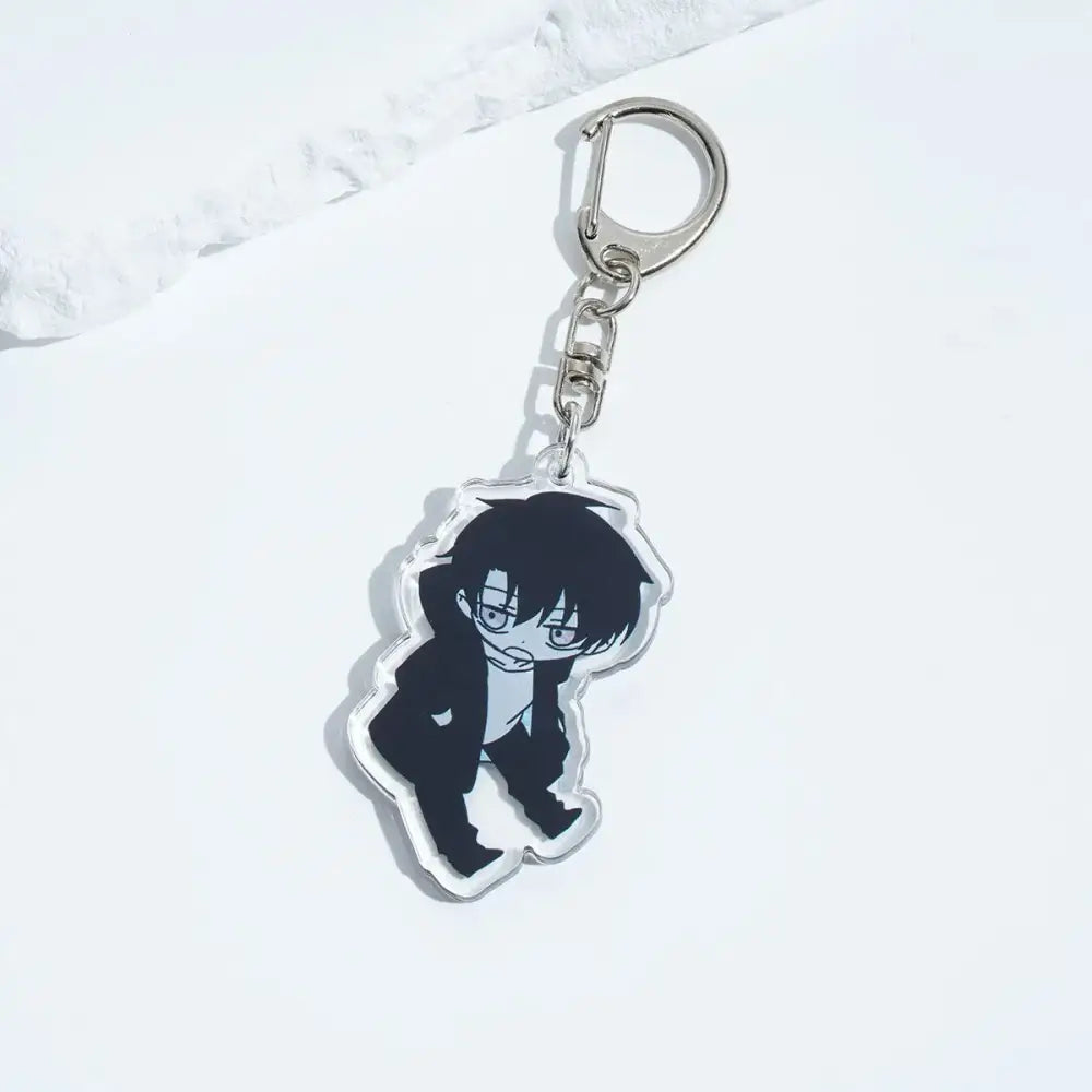 Clear acrylic solo leveling sung jin-woo keychain featuring black-haired anime character with glasses and metal clasp