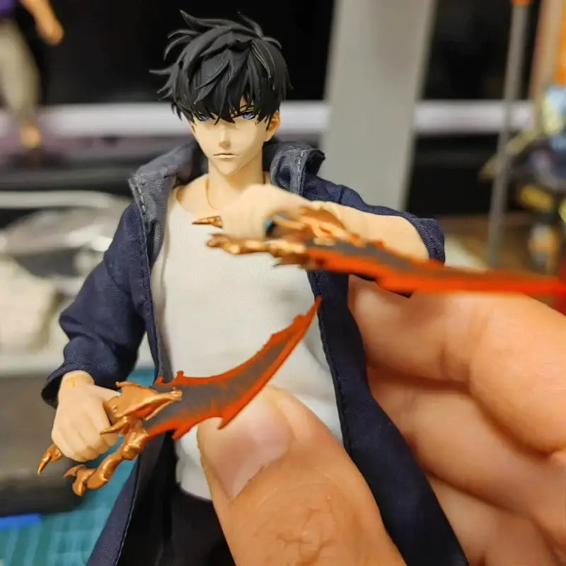 Solo leveling sung jin-woo action figure in navy jacket holding two red-orange dragon-themed weapons with gold accents