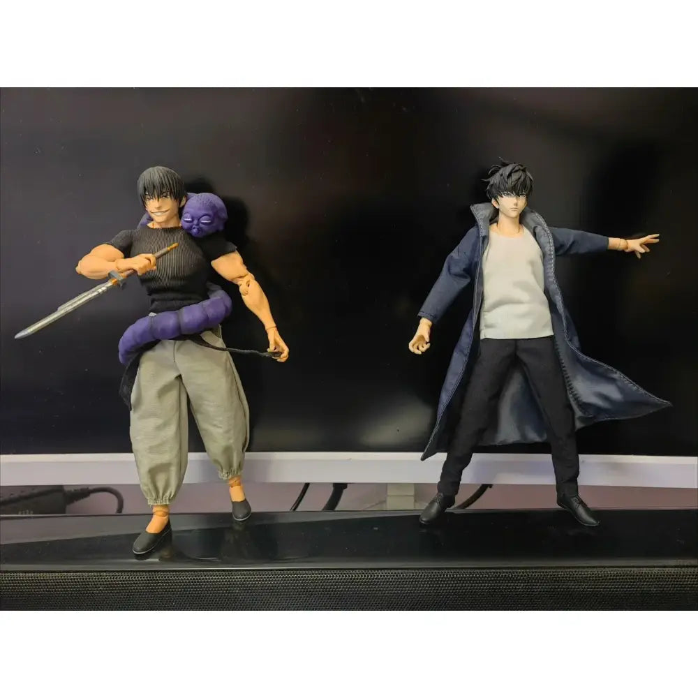 Two detailed solo leveling sung jin-woo articulated figures in black and navy with sword and purple figure accessory