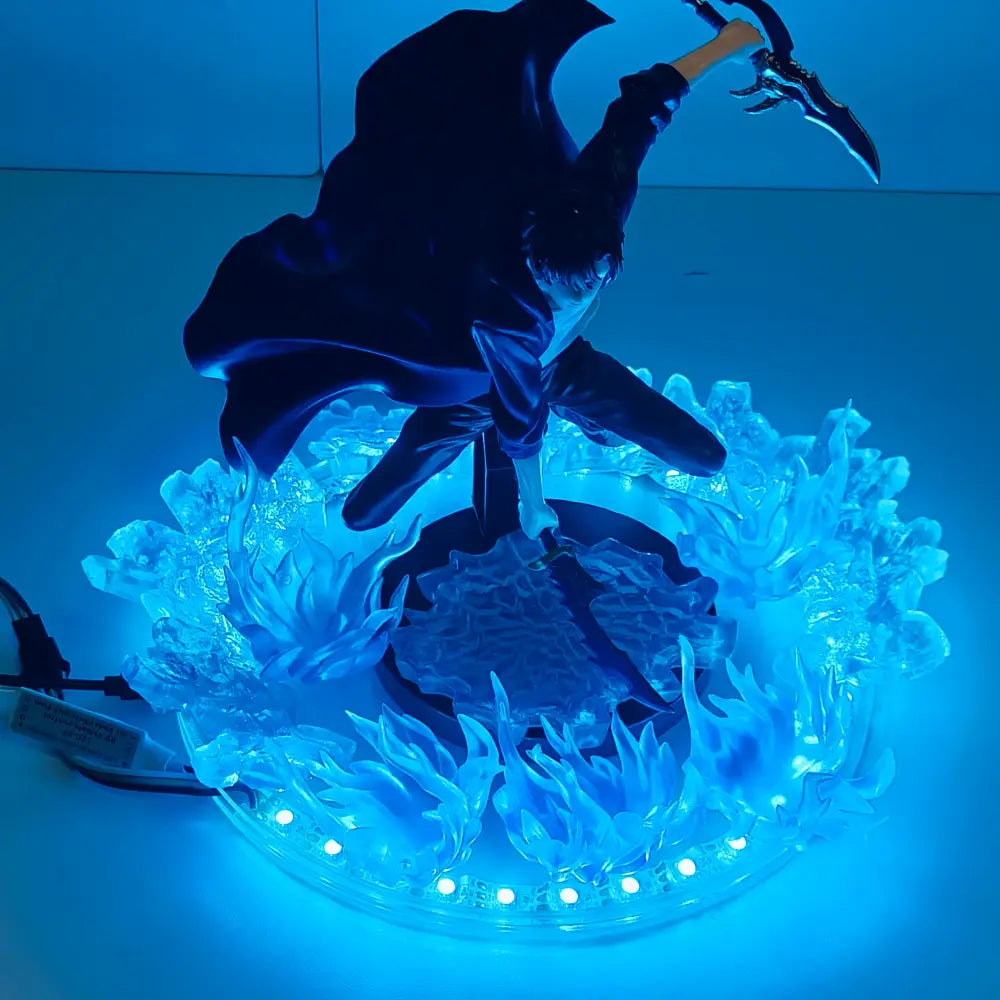 Blue led-lit solo leveling sung jin woo figurine with flowing dark cloak and glowing translucent flame base lamp