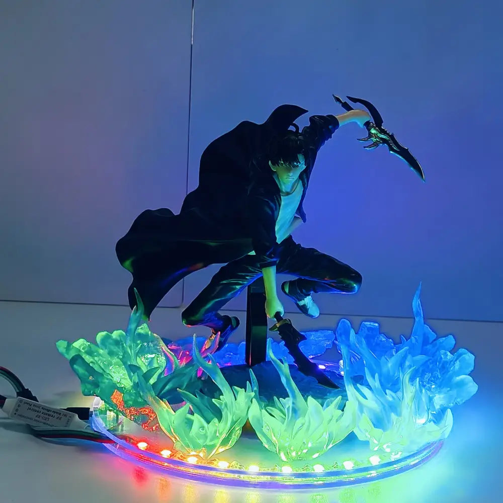 Black solo leveling sung jin woo anime figure statue with glowing green and blue led lights on circular base